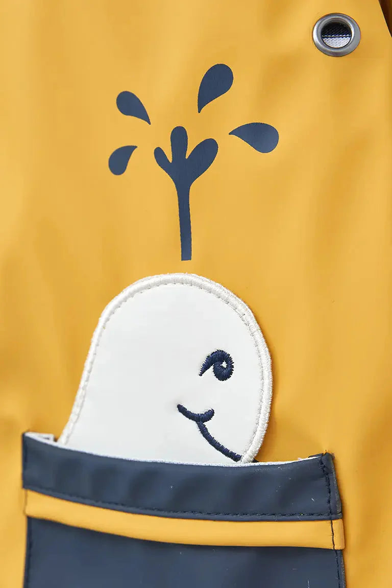 Impermeable de bebe bolsillos ballena amarillo