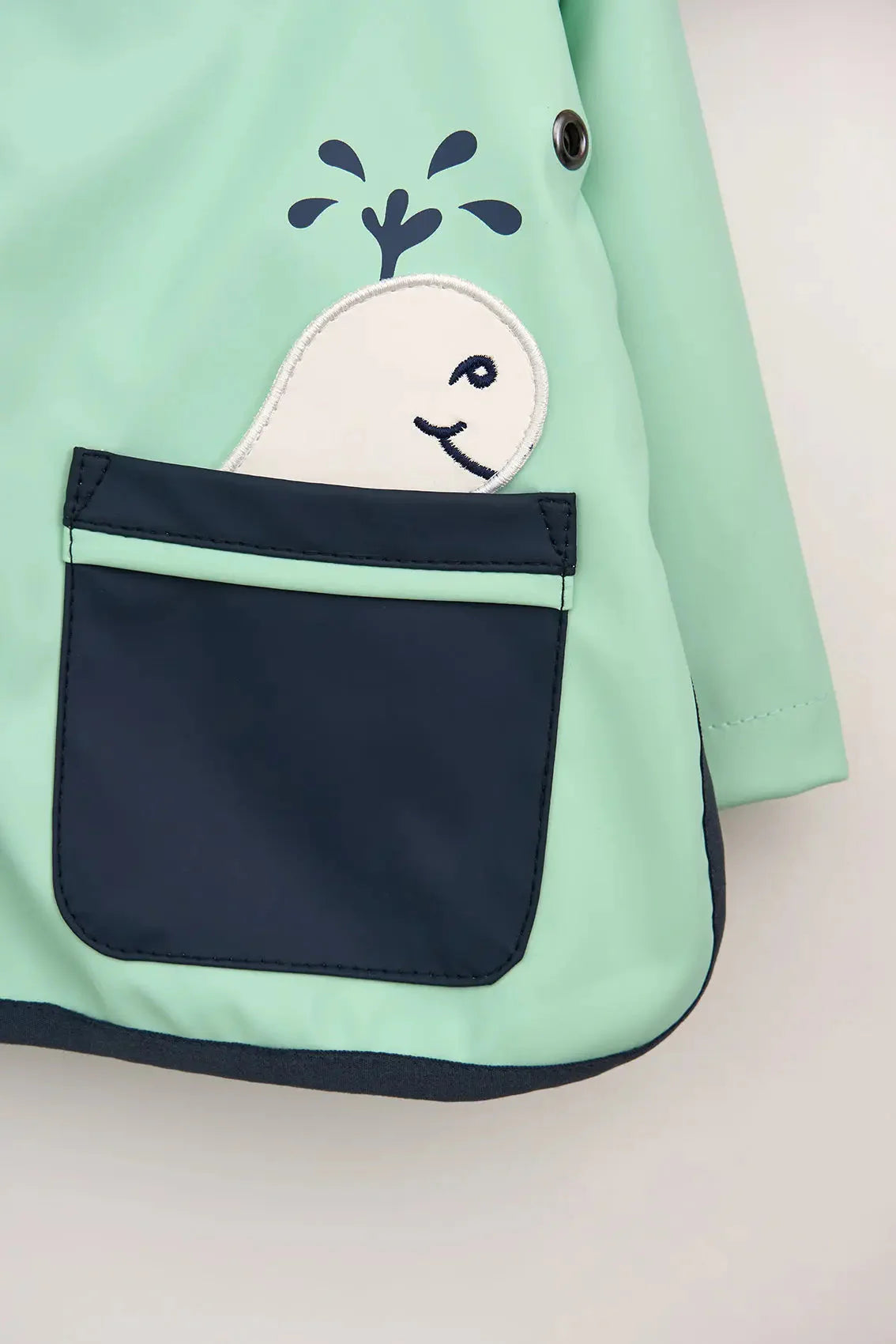 Impermeable de bebe bolsillos ballena verde menta